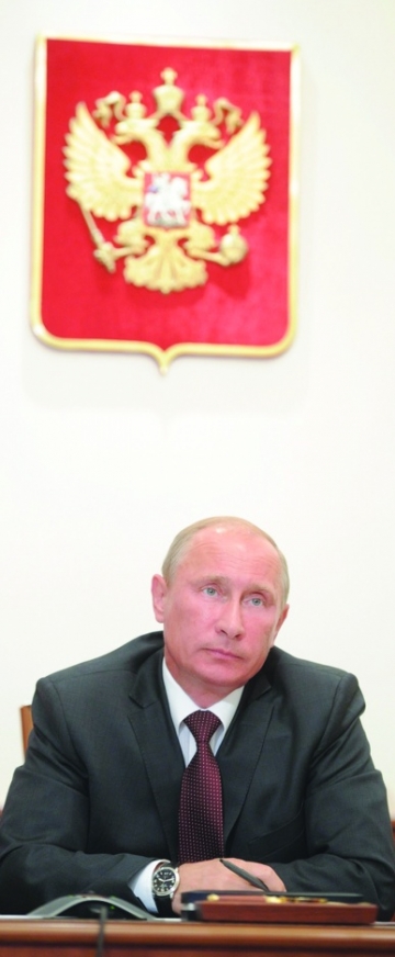 Vladimir Putin are Kremlinul in maneca